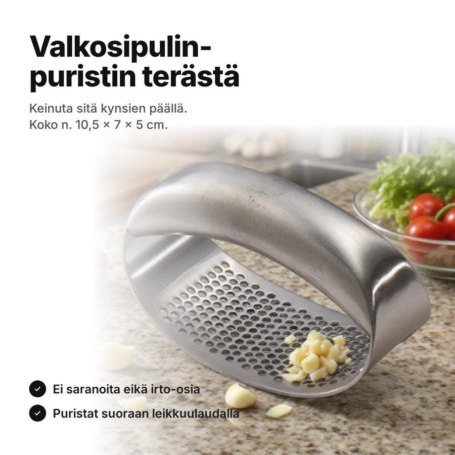 Valkosipulinpuristin ruostumatonta terästä keittiötasolla – n. 10,5 × 7 × 5 cm, ei saranoita eikä irtonaisia osia