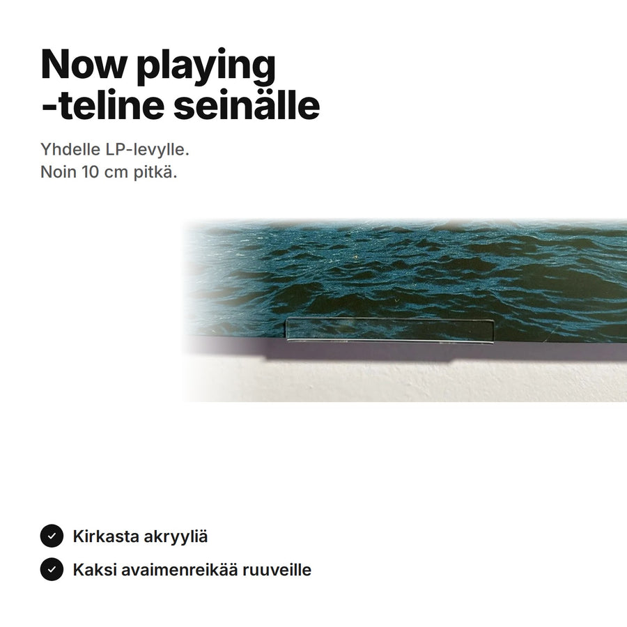 Now playing -teline seinälle: pieni kirkas akryylihylly, noin 10 cm, ja LP-levy