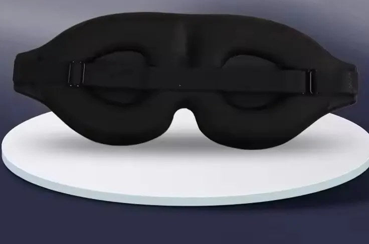 Musta 3D-muotoiltu unimaski, syvennykset silmille ja säädettävä hihna