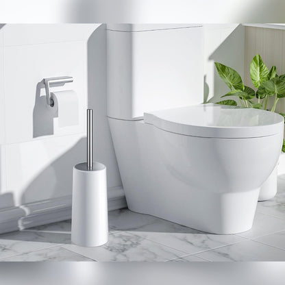 WC-harja valkoisessa telineessä lattialla valkoisen WC-istuimen vieressä