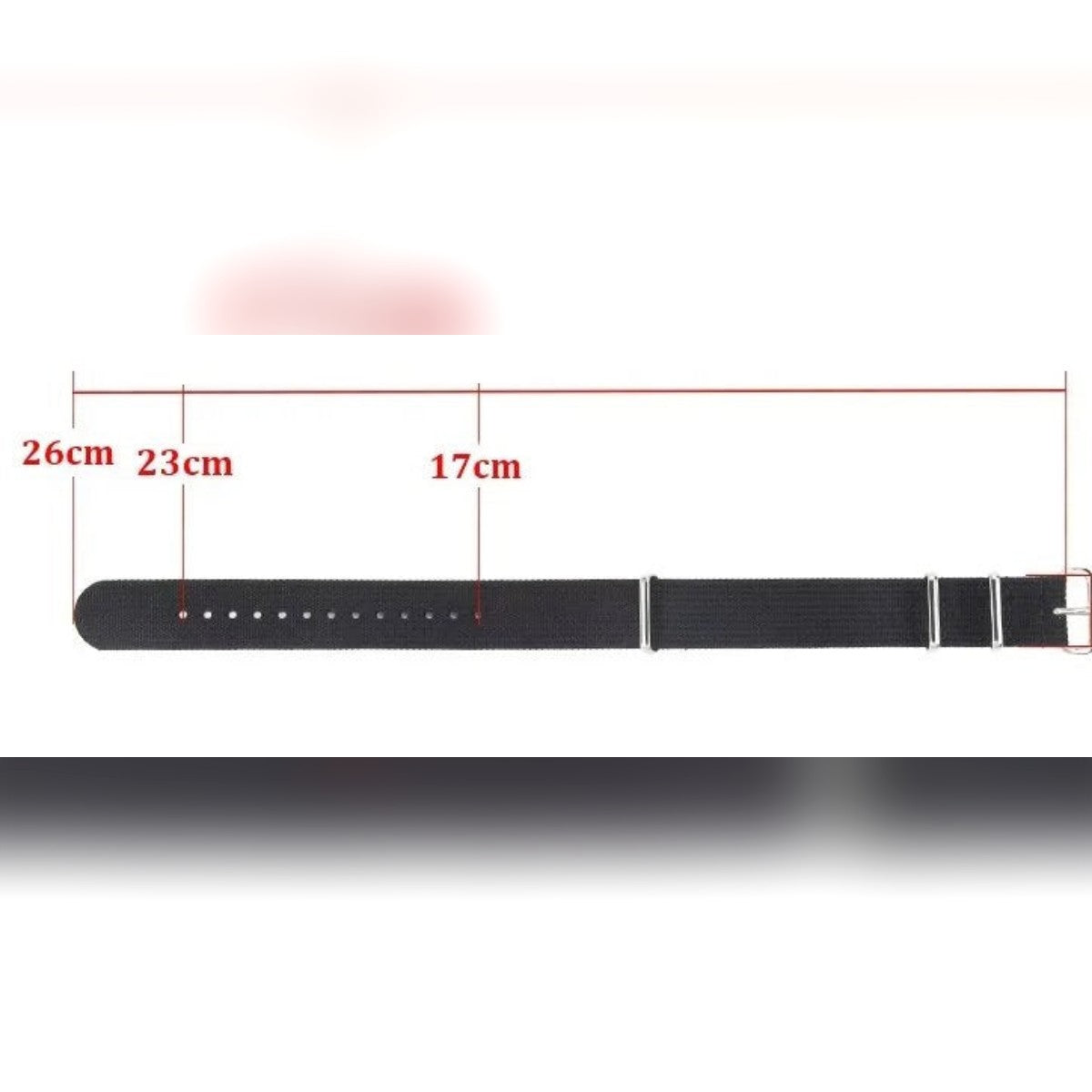 Toimittajan mittapiirros: ranneke noin 26 cm, reiät 17–23 cm:n päässä soljesta
