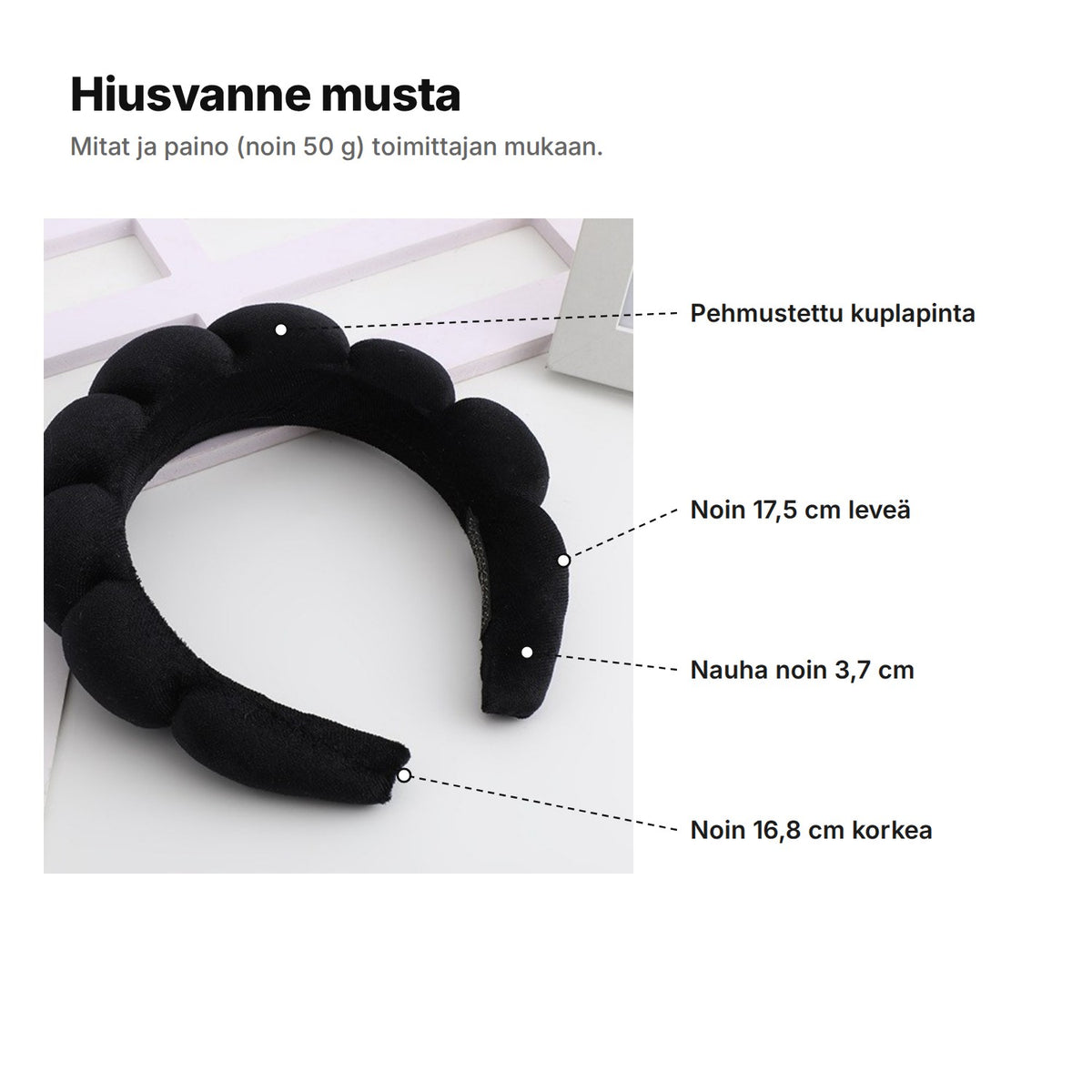Hiusvanne musta selitettynä: pehmustettu kuplapinta, noin 17,5 cm leveä, nauha noin 3,7 cm ja noin 16,8 cm korkea