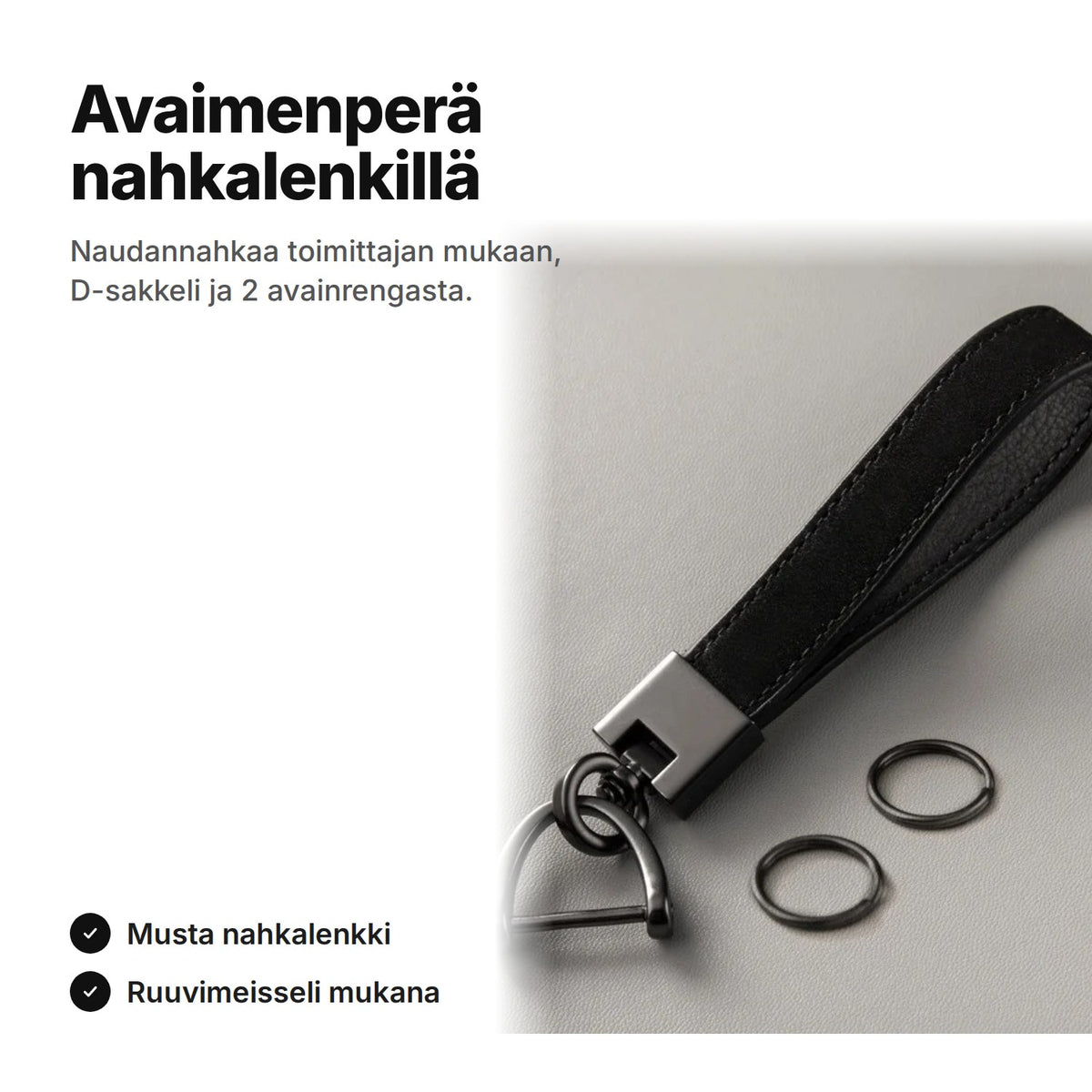 Musta avaimenperä nahkalenkillä, D-sakkeli ja kaksi avainrengasta