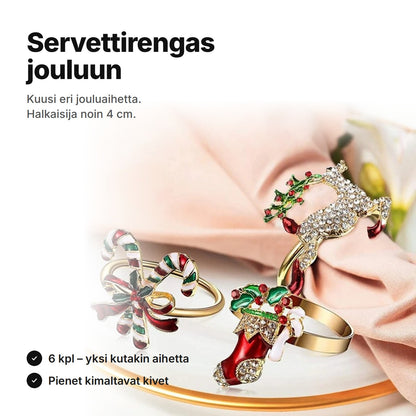 Servettirengas jouluun: kullanväriset renkaat, joissa karkkikepit, joulusukka ja poro, vaaleanpunaisen servetin vieressä – Ø noin 4 cm